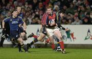 1 January 2005; Anthony Horgan, Munster, races clear of Brian O'Driscoll, Eric Miller and Shane Horgan, Leinster. Celtic League 2004-2005, Pool 1, Munster v Leinster, Musgrave Park, Cork. Picture credit; Brendan Moran / SPORTSFILE