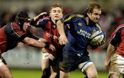 1 January 2005; Denis Hickie, Leinster, in action against Denis Leamy, left, and Shaun Payne, Munster. Celtic League 2004-2005, Pool 1, Munster v Leinster, Musgrave Park, Cork. Picture credit; Brendan Moran / SPORTSFILE