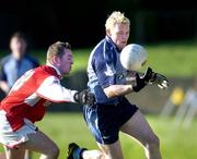 8 January 2005; Mark Vaughan, Dublin, in action against Alan Page, Louth. O'Byrne Cup, Quarter-Final, Louth v Dublin, O'Rahilly Park, Drogheda, Co. Louth. Picture credit; Ray McManus / SPORTSFILE