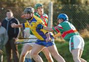 8 January 2005; Francie Quine, Roscommon, in action against Con Ryan, left, and Kevin Healy, right, Mayo. Knock airport.com Hurling League, Roscommon v Mayo, Mulherrin Park, Feurity, Co. Roscommon. Picture credit; Pat Murphy / SPORTSFILE