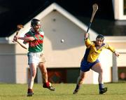 8 January 2005; Paul Broderick, Mayo, in action against Cian O'Brien, Roscommon. Knock airport.com Hurling League, Roscommon v Mayo, Mulherrin Park,Feurity, Co. Roscommon. Picture credit; Pat Murphy / SPORTSFILE