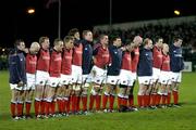 8 January 2005; The Munster team stand for a minute silence before the game in memory of the Asian Tsunami victims. Heineken European Cup 2004-2005, Round 5, Pool 4, Munster v Neath-Swansea Ospreys, Thomond Park, Limerick. Picture credit; Brendan Moran / SPORTSFILE
