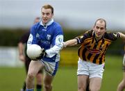 9 January 2005; Chris Bergin, Laois, in action against Alan Murphy, Kilkenny. O'Byrne Cup, Quarter-Final, Kilkenny v Laois, Pairc Lachtain, Freshford, Co. Kilkenny. Picture credit; Matt Browne / SPORTSFILE