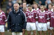 9 January 2005; Paidi O Se, Westmeath manager, stands along side his players during a minute silence in memory of the Asian Tsunami victims. O'Byrne Cup, Quarter-Final, Longford v Westmeath, Pearse Park, Longford. Picture credit; David Maher / SPORTSFILE