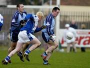 9 January 2005; Paddy Christie, Dublin, supported by team-mate Ciaran Whelan in action against Mark Vaughan, Dublin Blue Star. Dublin Footballers v Dublin Blue Star Footballers, Naomh Barrog, Kilbarrick, Dublin. Picture credit; Brian Lawless / SPORTSFILE