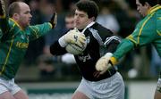 9 January 2005; Enda Murphy, Kildare, under pressure from Meath forwards Ollie Murphy, left, and Peadar Byrne. O'Byrne Cup, Quarter-Final, Kildare v Meath, St. Conleth's Park, Newbridge, Co. Kildare. Picture credit; Ray McManus / SPORTSFILE