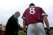 9 January 2005; 4th Official Paul Finegan counts the seconds on his watch before allowing back Colin Galligan, Westmeath, on the pitch, after he had been sin-binned for 10 minutes. O'Byrne Cup, Quarter-Final, Longford v Westmeath, Pearse Park, Longford. Picture credit; David Maher / SPORTSFILE