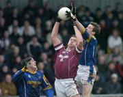 9 January 2005; John Brennan , Westmeath, in action against Trevor Glendenning, right and Kevin Mulligan, Longford. O'Byrne Cup, Quarter-Final, Longford v Westmeath, Pearse Park, Longford. Picture credit; David Maher / SPORTSFILE