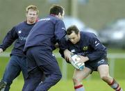 11 January 2005; Rob Henderson in action against Althony Foley, centre, and Anthony Horgan, left, during Munster Rugby squad training. Thomond Park, Limerick. Picture credit; Matt Browne / SPORTSFILE