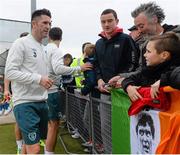 13 November 2013; Republic of Ireland's Robbie Keane signs autographs for supporters, at the end of squad training, ahead of their Three International Friendly match against Latvia on Friday. Republic of Ireland Squad Training, Gannon Park, Malahide, Co. Dublin. Picture credit: David Maher / SPORTSFILE