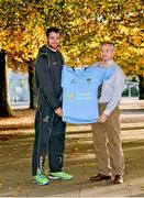 14 November 2013; Bobby Byrne, Director of Rugby UCD, presents Australia's James Horwill with a UCD RFC jersey. UCD, Belfield, Dublin. Picture credit: Barry Cregg / SPORTSFILE