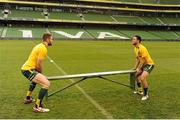 15 November 2013; Australia's Christian Leali'ifano and James Horwill, left, during the captain's run ahead of their Guinness Series International match against Ireland on Saturday. Australia Rugby Squad Captain's Run, Aviva Stadium, Lansdowne Road, Dublin. Picture credit: Stephen McCarthy / SPORTSFILE