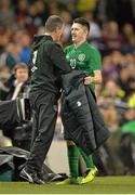 15 November 2013; Republic of Ireland assistant manager Roy Keane shakes hands with Robbie Keane as he is substituted in the second half. Three International Friendly, Republic of Ireland v Latvia, Aviva Stadium, Lansdowne Road, Dublin. Picture credit: Brendan Moran / SPORTSFILE
