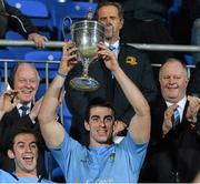 15 November 2013; UCD captain Shane Grannell lifts the cup. Leinster Senior League Cup Final, Terenure v UCD, Donnybrook Stadium, Donnybrook, Dublin. Picture credit: Ramsey Cardy / SPORTSFILE