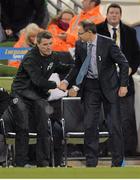 15 November 2013; Republic of Ireland manager Martin O'Neill, right, and assistant manager Roy Keane shake hands at the final whistle. Three International Friendly, Republic of Ireland v Latvia, Aviva Stadium, Lansdowne Road, Dublin. Picture credit: Matt Browne / SPORTSFILE