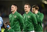 15 November 2013; The Republic of Ireland team showed their support for the White Ribbon campaign at tonight’s friendly international against Latvia at the Aviva stadium, by wearing white ribbons on their jackets during the National Anthem. White Ribbon is Ireland’s only national, male-led primary prevention campaign to end men’s violence against women. It is promoted in Ireland by the Men’s Development Network, a non-profit organisation. White Ribbon Day, on Monday, November 25th, focuses on men ending violence towards women. Three International Friendly, Republic of Ireland v Latvia, Aviva Stadium, Lansdowne Road, Dublin. Photo by Sportsfile *