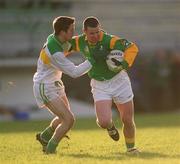 25 November 2001; Daithi Regan, Meath, in action against Karol Slattery, Offaly. Meath v Offaly, O'Byrne Cup, PAirc Tailteann, Navan. Football. Picture credit; Aoife Rice / SPORTSFILE