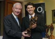 13 January 2005; Gerry McQuaid, Commercial Director 02, left, with Padraig Harrington 'Professional Golfer of the Year 2004' at the O2 Golf Writers of Ireland awards dinner. Elm Park Golf Club, Dublin. Picture credit; Matt Browne / SPORTSFILE