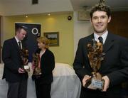 13 January 2005; Padraig Harrington 'Professional Golfer of the Year 2004', pictured with Men's Amateur of the Year winner Brian Elhinney and Lady's Amateur of the Year winner Claire Coughlan at the O2 Golf Writers of Ireland awards dinner. Elm Park Golf Club, Dublin. Picture credit; Matt Browne / SPORTSFILE