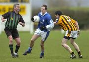 9 January 2005; Chris Conway, Laois, in action against Paul Mullins, Kilkenny. O'Byrne Cup, Quarter-Final, Kilkenny v Laois, Pairc Lachtain, Freshford, Co. Kilkenny. Picture credit; Matt Browne / SPORTSFILE