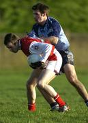 8 January 2005; Alan McCartney, Louth, in action against Bryan Cullen, Dublin. O'Byrne Cup, Quarter-Final, Louth v Dublin, O'Rahilly Park, Drogheda, Co. Louth. Picture credit; Ray McManus / SPORTSFILE