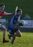 8 January 2005; Cian Hore, Dublin, in action against Louth's Alan McCartney. O'Byrne Cup, Quarter-Final, Louth v Dublin, O'Rahilly Park, Drogheda, Co. Louth. Picture credit; Ray McManus / SPORTSFILE