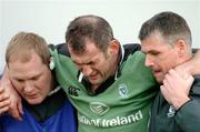 15 January 2005; Eric Elwood, Connacht, is helped off the field during the early stages of the game. European Challenge Cup 2004-2005, Quarter-Final, Connacht v Grenoble, Sportsground, Galway. Picture credit; Pat Murphy / SPORTSFILE