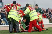 15 January 2005; Eric Elwood, Connacht, is helped onto the stretcher by medical staff. European Challenge Cup 2004-2005, Quarter-Final, Connacht v Grenoble, Sportsground, Galway. Picture credit; Pat Murphy / SPORTSFILE