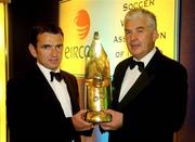 15 January 2005; Cathal Magee, Managing Director, eircom Retail, presents the eircom / Soccer Writers Association of Ireland 'Personality of the Year' award to Shelbourne manager Pat Fenlon. eircom / SWAI Personality of the Year Award, Rochestown Park Hotel, Rochestown, Cork. Picture credit; Ray McManus / SPORTSFILE