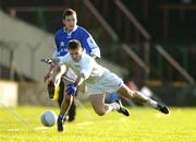 16 January 2005; Shane Cooke, Laois, has his shot blocked by Mick Wright, Kildare. O'Byrne Cup, Semi-Final, Laois v Kildare, O'Moore Park, Portlaoise, Co. Laois. Picture credit; Matt Browne / SPORTSFILE