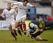 16 January 2005; Andrew Maxwell, Ulster, in action against Freddy Tuilagi, Cardiff Blues. Heineken European Cup 2004-2005, Round 6, Pool 6, Cardiff Blues v Ulster, Cardiff Arms Park, Cardiff, Wales. Picture credit; Brian Lawless / SPORTSFILE