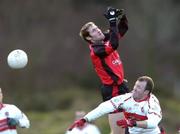 16 January 2005; Alan Molloy, Down, in action against Johny McBride, Derry. McKenna Cup, Down v Derry, Pairc an Iuir, Newry, Co. Down. Picture credit; David Maher / SPORTSFILE