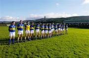 16 January 2005; TheTipperary team, who had not played a game in 38 weeks, stand for a minute silence before the game in memory of the Asian Tsunami victims. McGrath Cup, Tipperary v Kerry, Clonmel sports field, Clonmel, Co. Tipperary. Picture credit; Ray McManus / SPORTSFILE