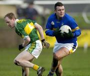 16 January 2005; Fergal O'Callaghan, Tipperary, in action against Mossy Lyons, Kerry. McGrath Cup, Tipperary v Kerry, Clonmel sports field, Clonmel, Co. Tipperary. Picture credit; Ray McManus / SPORTSFILE