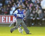 16 January 2005; Laois fan Joe Phelan from Turduff, Co. Laois, tries to catch the cockeral during the game. O'Byrne Cup, Semi-Final, Laois v Kildare, O'Moore Park, Portlaoise, Co. Laois. Picture credit; Matt Browne / SPORTSFILE