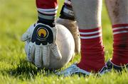 16 January 2005; Louth goalkeeper Sean Connor places the ball on a tee before kicking the ball out. O'Byrne Cup, Semi-Final, Louth v Westmeath, O'Rahilly Park, Drogheda, Co. Louth. Picture credit: Damien Eagers / SPORTSFILE