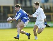 16 January 2005; Shane Cooke, Laois, in action against Mick Wright, Kildare. O'Byrne Cup, Semi-Final, Laois v Kildare, O'Moore Park, Portlaoise, Co. Laois. Picture credit; Matt Browne / SPORTSFILE