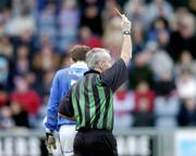 16 January 2005; Padraig McMahon, Laois, is sent to the sin-bin by referee Paul Finnegan. O'Byrne Cup, Semi-Final, Laois v Kildare, O'Moore Park, Portlaoise, Co. Laois. Picture credit; Matt Browne / SPORTSFILE
