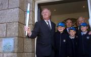 18 January 2005; Minister for Art, Sport and Tourism, John O'Donoghue, T.D., with pupils from Scoil Mhuire, Howth at the opening of the first permanent Headquarters of the Olympic Council of Ireland in Howth, Co. Dublin. Picture credit; Damien Eagers / SPORTSFILE