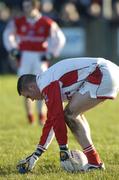16 January 2005; Sean Connor, Louth goalkeeper places a kicking tee on the ground before kicking the ball out. O'Byrne Cup, Semi-Final, Louth v Westmeath, Gaelic Grounds, Drogheda, Co. Louth. Picture credit; Damien Eagers / SPORTFILE