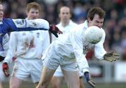 16 January 2005; Michael Foley, Kildare, in action against Stephen Kelly, Laois. O'Byrne Cup, Semi-Final, Laois v Kildare, O'Moore Park, Portlaoise, Co. Laois. Picture credit; Matt Browne / SPORTSFILE