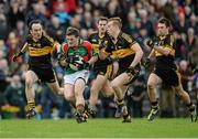 16 November 2013; Liam McGrath, Loughmore-Castleiney, in action against, from left, Shane Myers, Eoin Brosnan, Fionn Fitzgerald and John Payne, Dr. Crokes. AIB Munster Senior Club Football Championship, Semi-Final, Dr. Crokes v Loughmore-Castleiney, Dr. Crokes GAA Club, Killarney, Co. Kerry. Picture credit: Diarmuid Greene / SPORTSFILE