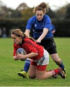 16 November 2013; Niamh O'Sullivan, Munster, is tackled by Maeve O'Brien, Leinster. Girls U18 Interprovincial Blitz, Westmanstown RFC, Westmanstown, Co. Dublin. Picture credit: Barry Cregg / SPORTSFILE