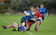 16 November 2013; Maeve O'Brien, Leinster is tackled by Neasa McKenna, left, and Chloe Dalton, Munster. Girls U18 Interprovincial Blitz, Westmanstown RFC, Westmanstown, Co. Dublin. Picture credit: Barry Cregg / SPORTSFILE