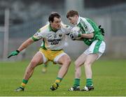 17 November 2013; Marty Beagan, Roslea Shamrocks, in action against Michael Murphy, Glenswilly. AIB Ulster Senior Club Football Championship, Semi-Final, Glenswilly, Donegal v Roslea Shamrocks, Fermanagh. Healy Park, Omagh, Co. Tyrone. Picture credit: Oliver McVeigh / SPORTSFILE