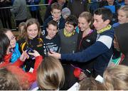 17 November 2013; Fionnuala Britton, Kilcoole A.C, Co. Wicklow, meets fans after the 2013 Woodie’s DIY Inter County & Juvenile Even Age Cross Country Championships of Ireland. Santry Demesne, Santry, Co. Dublin. Picture credit: Ramsey Cardy / SPORTSFILE