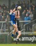 17 November 2013; Sean Devlin, Kilcoo Owen Roes, in action against Ryan Bell, Ballinderry Shamrocks. AIB Ulster Senior Club Football Championship, Semi-Final, Ballinderry Shamrocks, Derry v Kilcoo Owen Roes, Down. Athletic Grounds, Armagh. Photo by Sportsfile