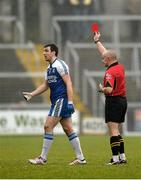17 November 2013; Kevin McGuckin, Ballinderry Shamrocks, is shown a red card by referee Martin Higgins. AIB Ulster Senior Club Football Championship, Semi-Final, Ballinderry Shamrocks, Derry v Kilcoo Owen Roes, Down. Athletic Grounds, Armagh. Photo by Sportsfile