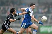 17 November 2013; Kevin McGuckin, Ballinderry Shamrocks, in action against Niall Branagan, Kilcoo Owen Roes. AIB Ulster Senior Club Football Championship, Semi-Final, Ballinderry Shamrocks, Derry v Kilcoo Owen Roes, Down. Athletic Grounds, Armagh. Photo by Sportsfile
