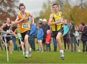 17 November 2013; Donal Devane, Co. Clare, Munster, left, and Sean Corry, Omagh Harriers A.C, Co. Tyrone, Ulster, competing in the Boys U14's race at the 2013 Woodie’s DIY Inter County & Juvenile Even Age Cross Country Championships of Ireland. Santry Demesne, Santry, Co. Dublin. Picture credit: Ramsey Cardy / SPORTSFILE